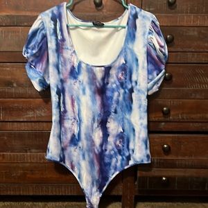 Never worn Bebe bodysuit With snaps.